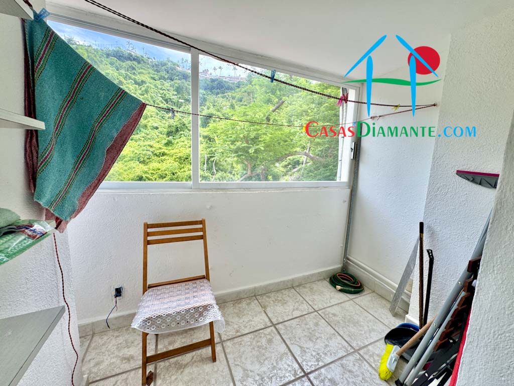 Brisas Diamante T1 108 - Cuarto de servicio 1